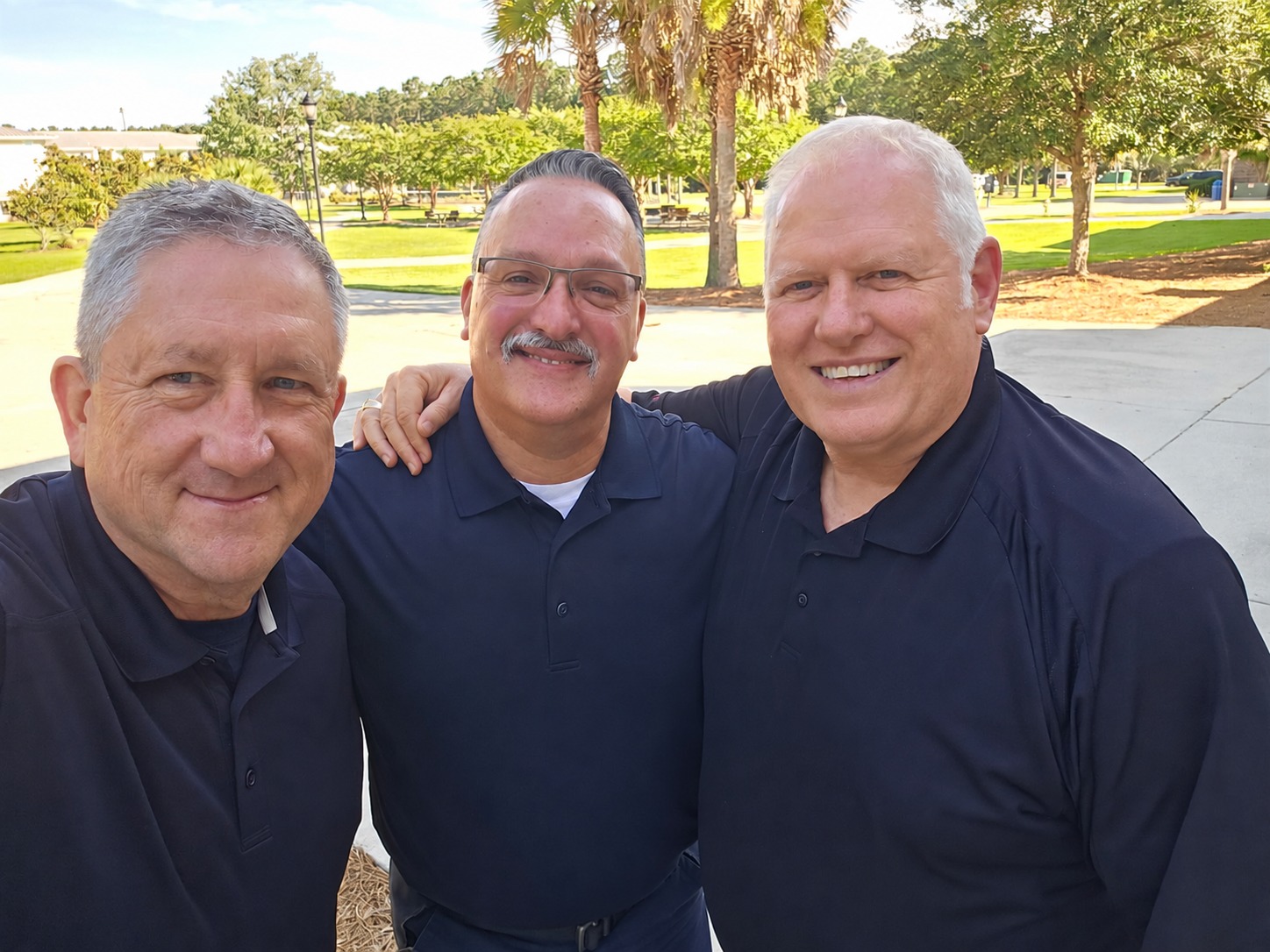 Stephen outdoors with two colleagues from TEEX